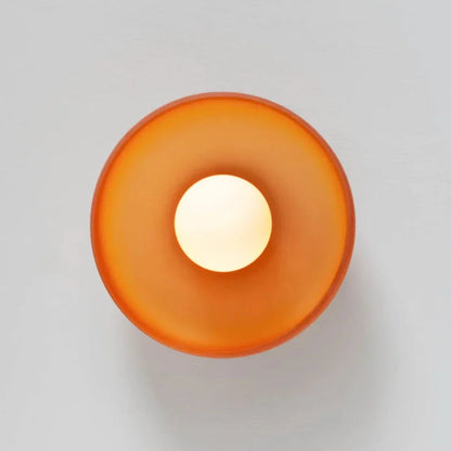 Amber glass wall sconce for bedroom warm lighting