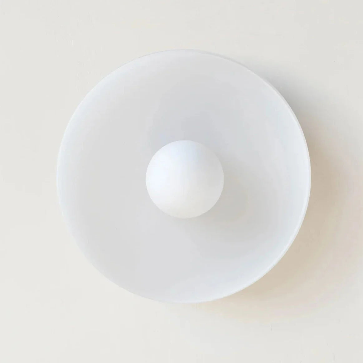White Nordic wall sconce for bedroom