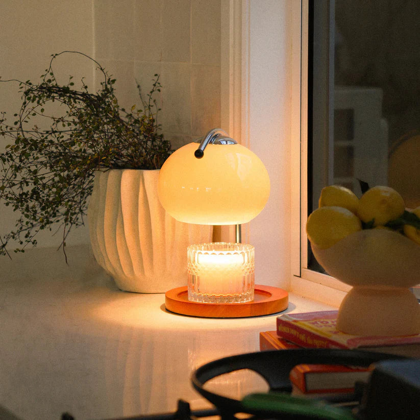 The Solange - Lucy’s Lamps is a modern table lamp with candle warmer lamp functionality. Aesthetic retro stained glass lamp ideal as a bedside table lamp, small desk lamp, or minimalist side table lamp. Perfect for bedroom table lamps or modern lamp for living room styling. Explore Lucys Lamps for more home lighting ideas.